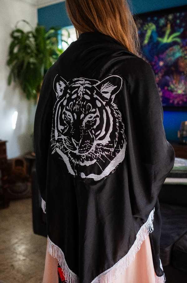 Black embroidered shawl with tiger spirit motif and white fringe, handcrafted as a 1-of-1 ceremonial warrior wrap for ritual use, spiritual gatherings, and daily empowerment.