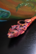Hand-carved Fox Spirit ceremonial pipe with vibrant jaguar and serpent motifs, crafted in the Amazon using natural pigments for sacred rituals and altar display.